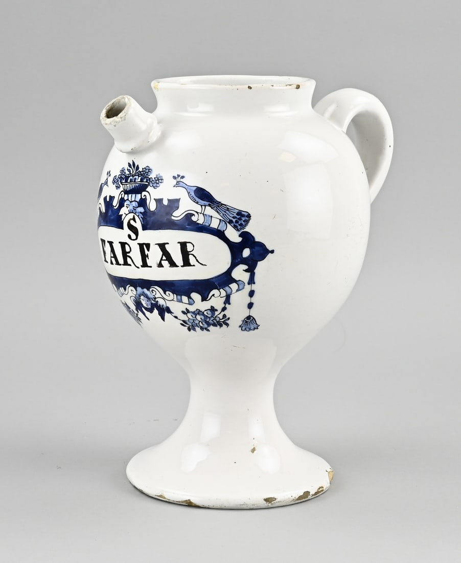 Delft apothecary jar, H 26 cm.: 18th - 19th century Delft faience apothecary jar with peacock decoration. Dimensions: H 26 cm. In good condition.