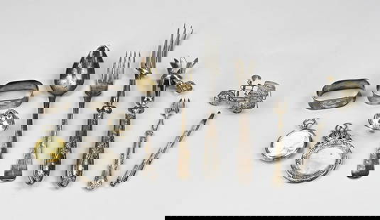 Lot of silver cutlery: Lot of cutlery, including a serving cutlery with silver handles, a silver spoon and fork, a sardine fork with silver handle, a silver cap, a silver pen, a silver watch case, a silver medal with hands