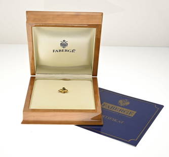 Fabergé gold pin: Yellow gold brooch, 750/000, Fabergé, in the shape of an elephant with green and red enamel. 14x12.5mm. No. 51/300. With original box and certificate. F1536. Approx. 2.8 grams. In very good condition