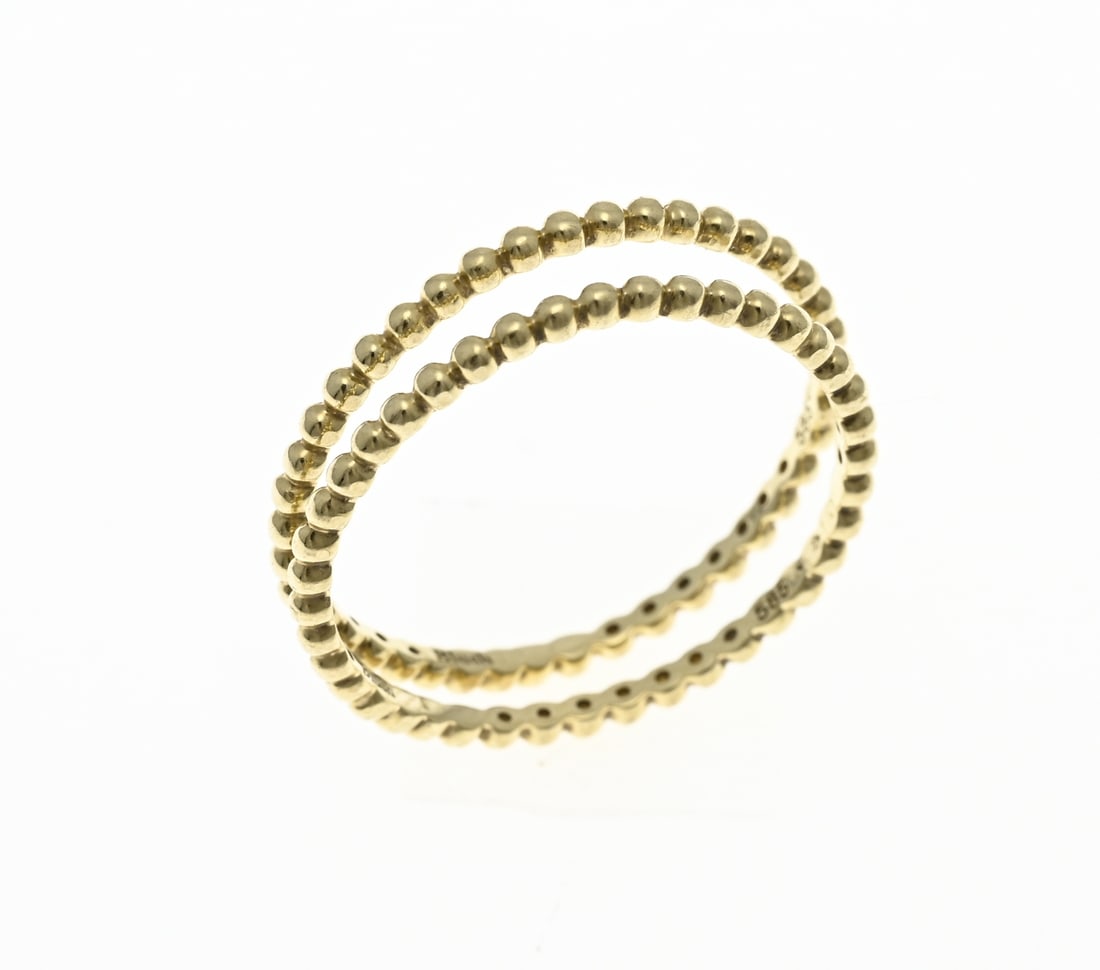 Gold sliding rings with pearl motif: Yellow gold sliding rings, 585/000, with a pearl finish. Width 1.2 mm per ring. ø 52. approx. 1.6 grams. in good condition.