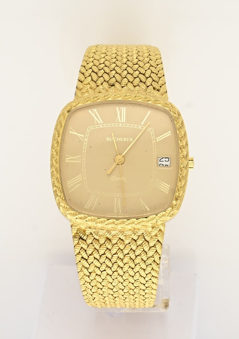 Bucherer watch: Gold-plated unisex Bucherer watch with a square-shaped case and a twisted bezel. The watch comes with a braided strap. Case width: 32 mm. Length: 18.5 cm. Quartz movement. Working. Engraved on the cas