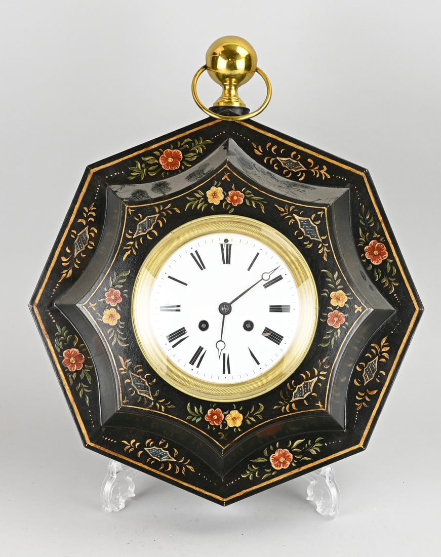 French wall clock, 1850: 19th-century French painted tin wall clock. Circa 1850. Eight-day movement, half-hour strike, spring pendulum. Dimensions: 42 cm in diameter. In good condition.
