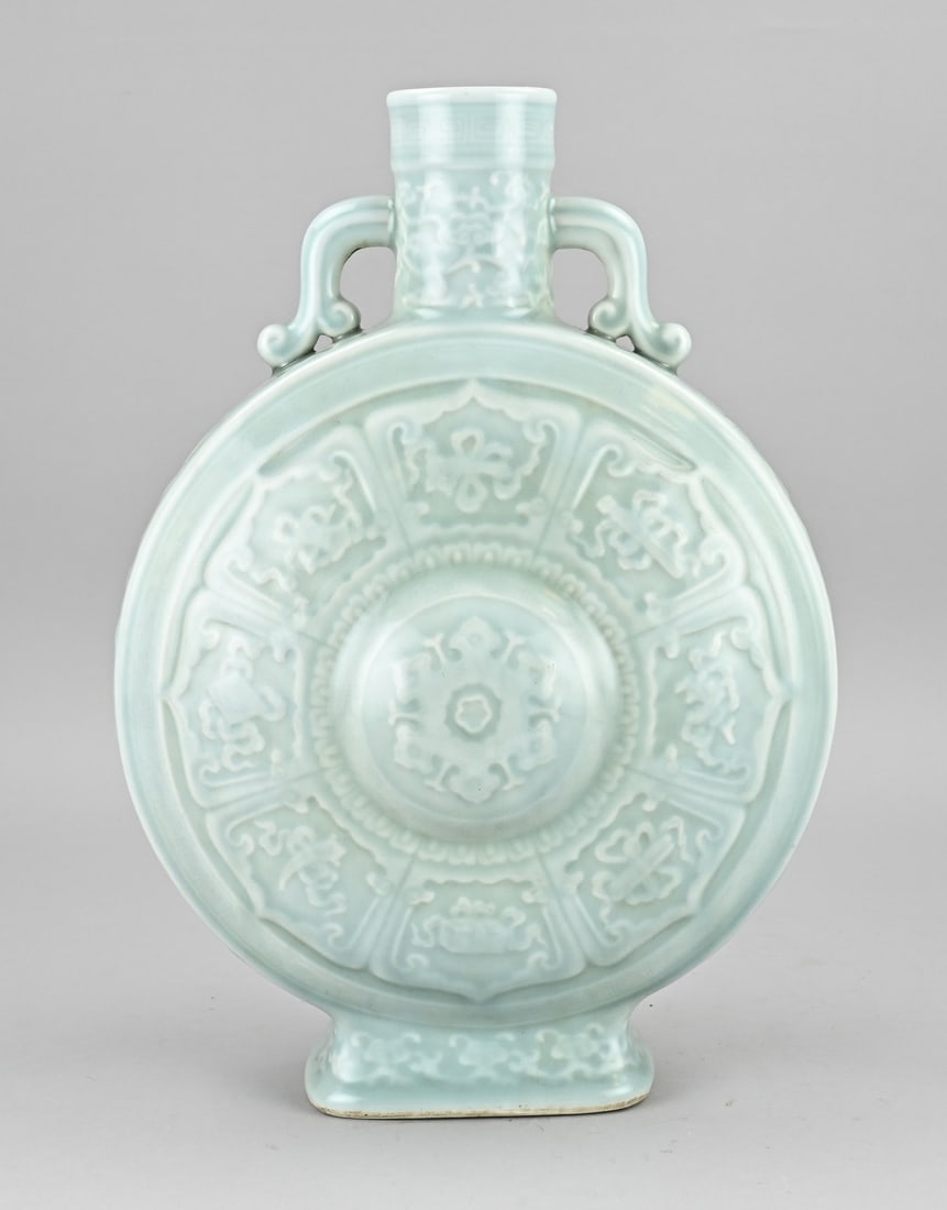 Chinese moon vase, H 36 cm.: Chinese green celadon porcelain moon vase with auspicious symbols and floral decoration. With base mark. Dimensions: H 36 cm. In good condition.