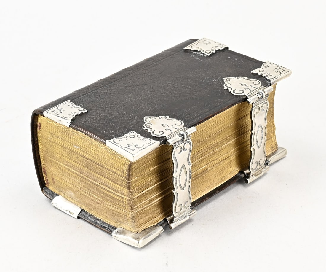 Antique Bible with silverware (1 of 1)