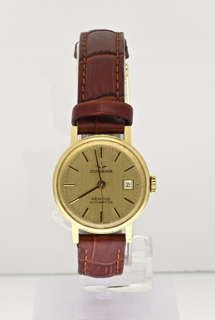 Gold watch, Dugena: Yellow gold ladies' watch, 585/000, Dugena, Geneve automatica. Case diameter 25 mm. Equipped with a date display. Case number: 472 764 296. The watch has a brown leather strap. In good condition.