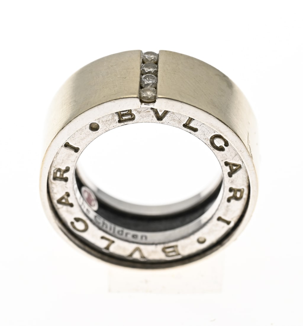 Bulgari ring with diamond: Beautiful silver Bulgari ring, 925/000, with a wide, sleek band in the center set with 4 brilliant-cut diamonds. The ring features a wide inner ring marked BVLGARI. Marked on the inside with CV12654.