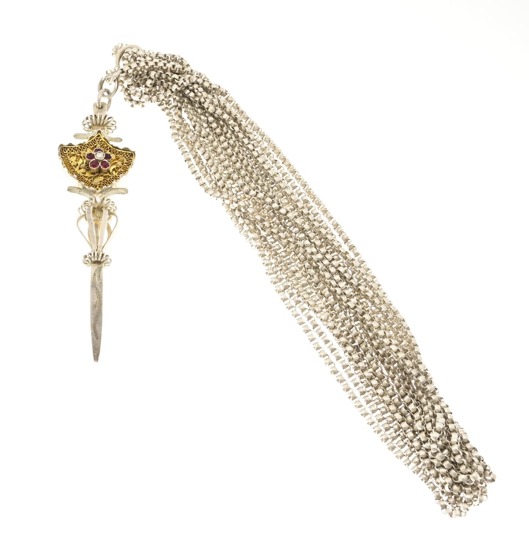 Silver necklace with Miederstecher: Long silver necklace with a traditional Miederstecher pendant featuring a gilded shield-shaped element with a rosette containing red and a pearl. Length 11 cm. Necklace length approx. 330 cm. Approx.