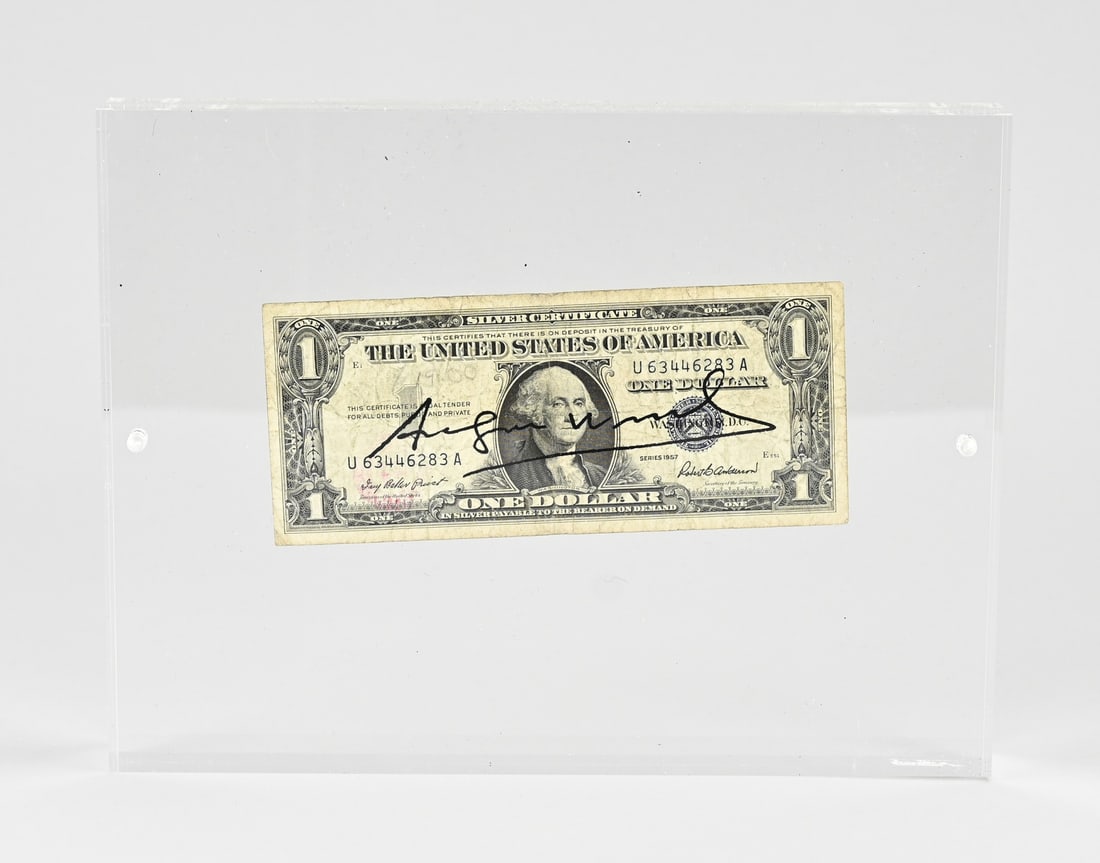 Andy Warhol, One Dollar + certificate: Andy Warhol. One Dollar bill in PVC, with certificate. Dimensions: H 18 x W 24 cm. In good condition.