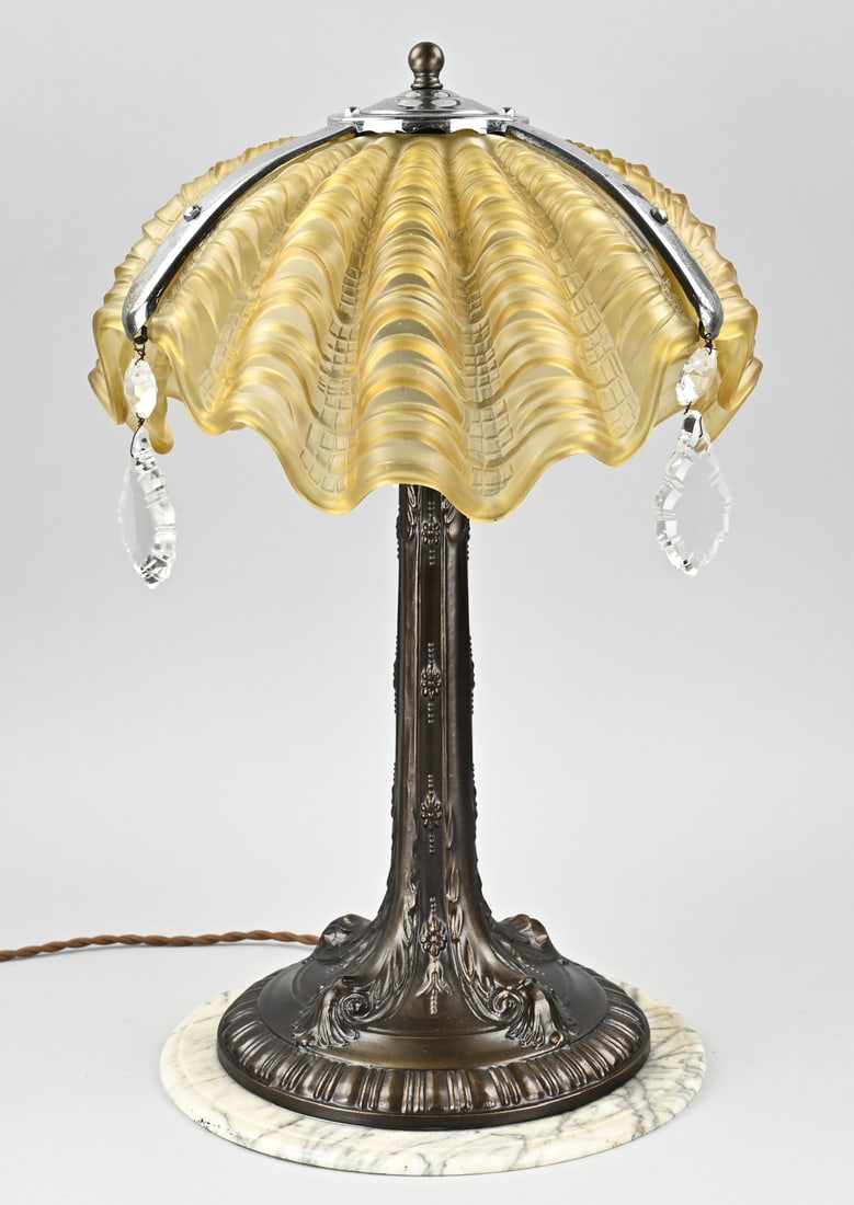 French table lamp, H 53 cm.: Antique, French, Art Deco table lamp, with an oyster-shaped glass shade and a composite metal base with marble. Circa 1920. Dimensions: H 53 cm. In good condition.