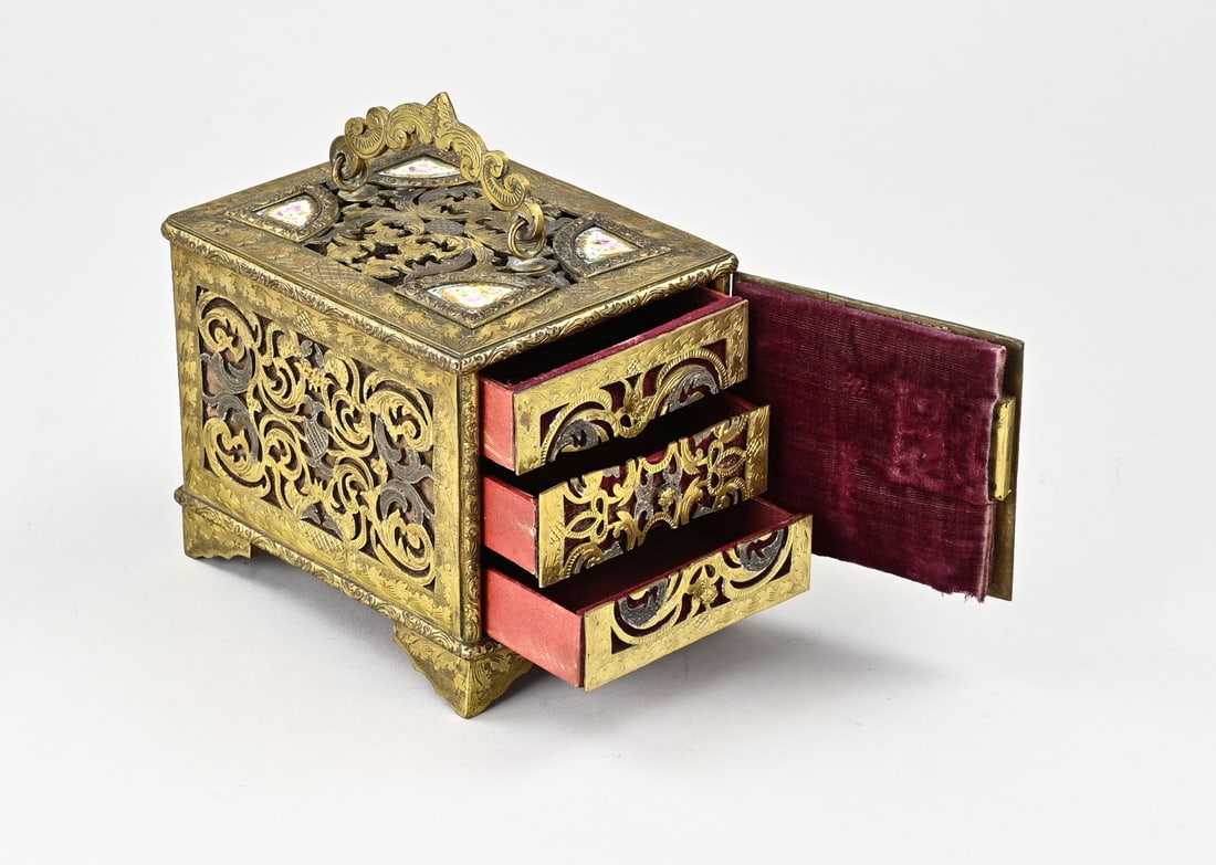 Brass jewelry box (France): French, 18th-19th century gilded brass jewelry box with openwork saw motif and Sevres plaques, with three drawers behind the door. Dimensions: 13 x 14 x 11 cm. In good condition.
