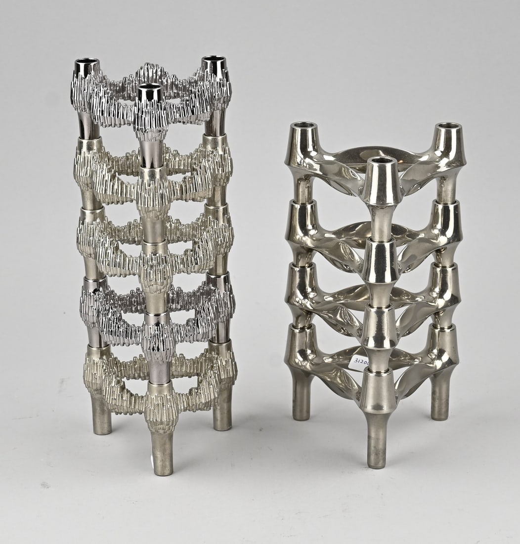 2x Hufnagel candlestick: 2x Hufnagel chrome stacking candlesticks, from the 1960s. Germany. Dimensions: 21 - 26 cm. In good condition.