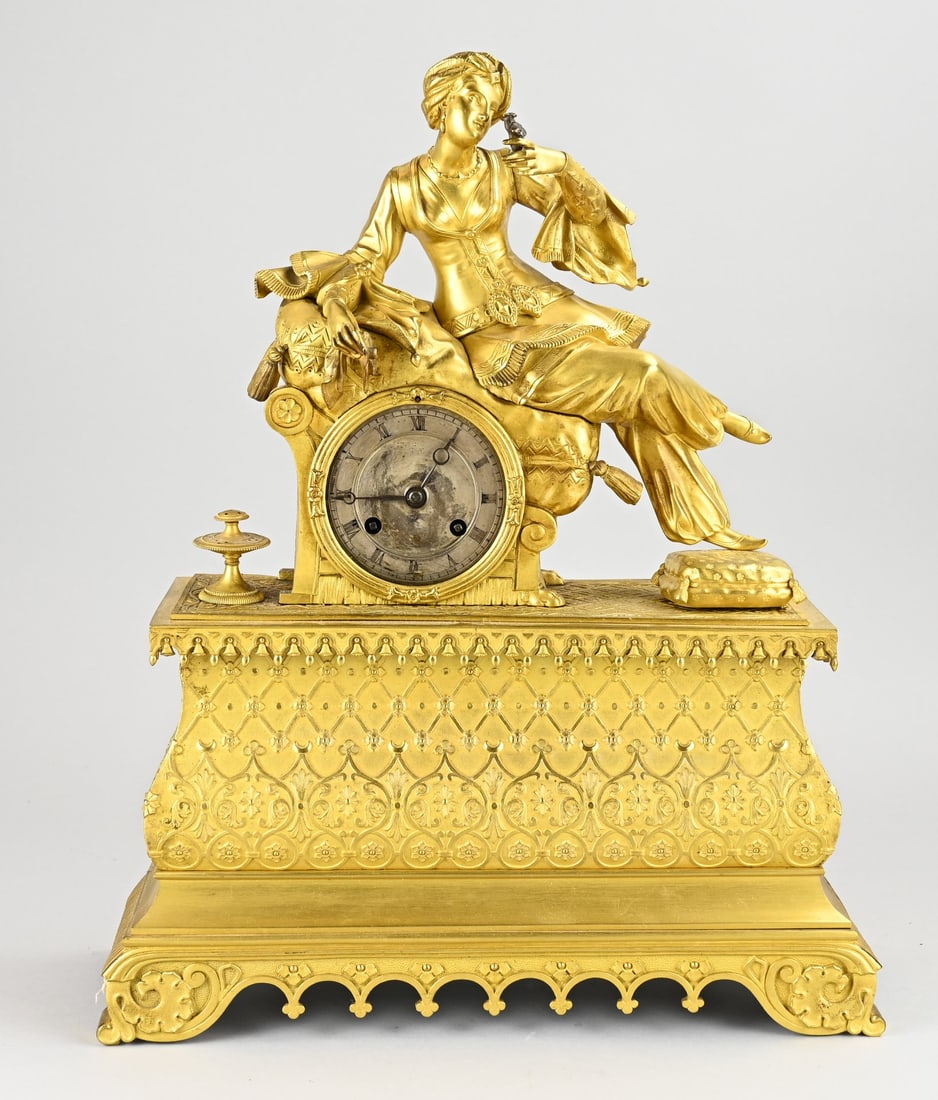 Charles Dix pendulum, Oriental woman: Antique, French, fire-gilded bronze Charles Dix pendulum clock with Oriental woman in a turban. Eight-day movement, half-hour strike + string pendulum. Dimensions: H 42 cm. In good condition.