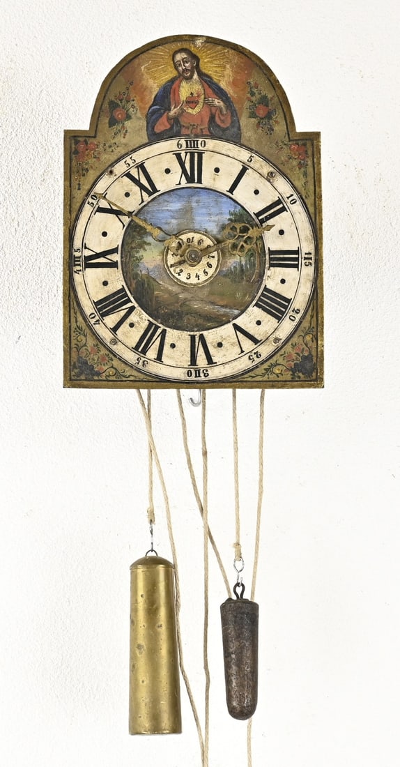 South German Ironwork: 18th-century South German Baroque iron clock with alarm function, anchor escapement, striking mechanism with two hammers and two bells. Not tested. Dimensions: 12 x 36 x 26.5 cm. In good condition.