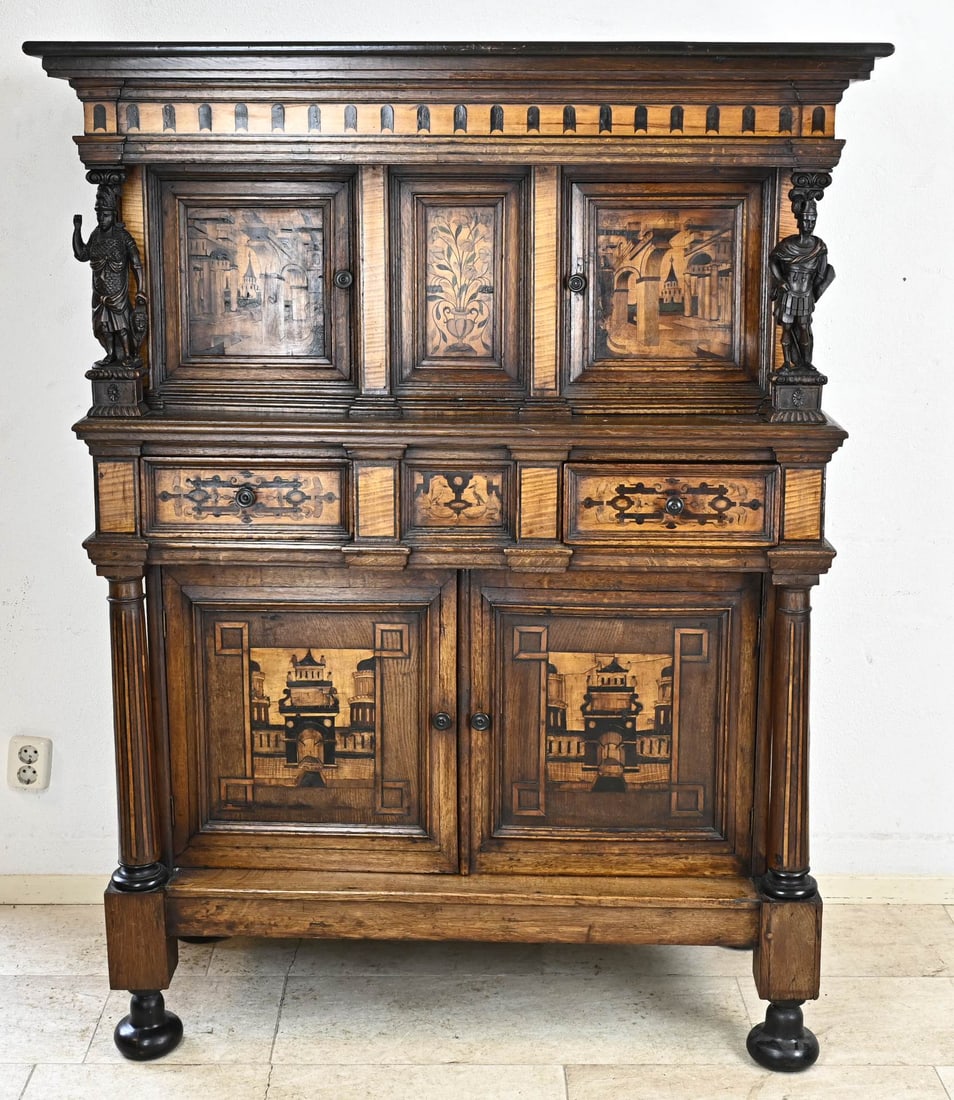 Ulmer cushion cabinet with intarsia: Antique, German, 2-piece Ulmer cushion cabinet with older sculpted Renaissance figures + intarsia. With four doors and two drawers. Dimensions: 163 x 124 x 58 cm. In good condition.