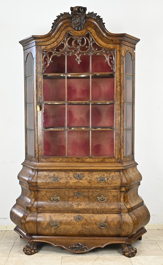 Dutch display cabinet: 19th-century Dutch burr walnut display cabinet with fine Rococo carving, crown, moldings, claw feet, and bronze fittings. Dimensions: 220 x 135 x 50 cm. In good condition.