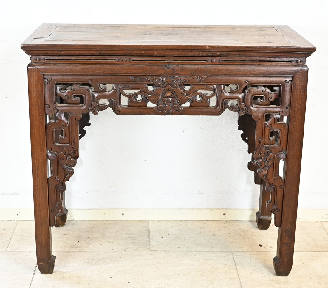 Chinese wall table: Old Chinese carved wooden console table. Openwork. 20th century. Dimensions: 91 x 51 x 103 cm. In good condition.