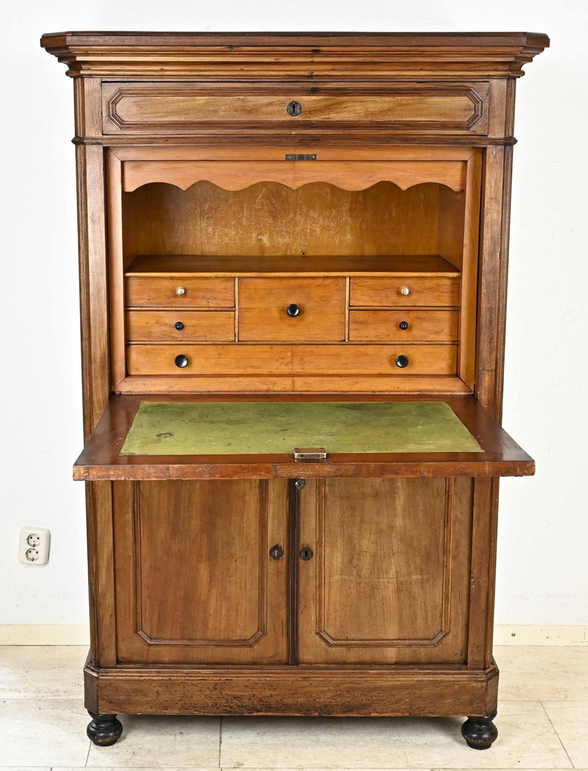 Notebook, 1870: Walnut Louis Philippe secretary desk with two lower doors, interior with various storage drawers and a storage compartment behind the flap. Circa 1870. Dimensions: 161 x 105 x 50 cm. In good