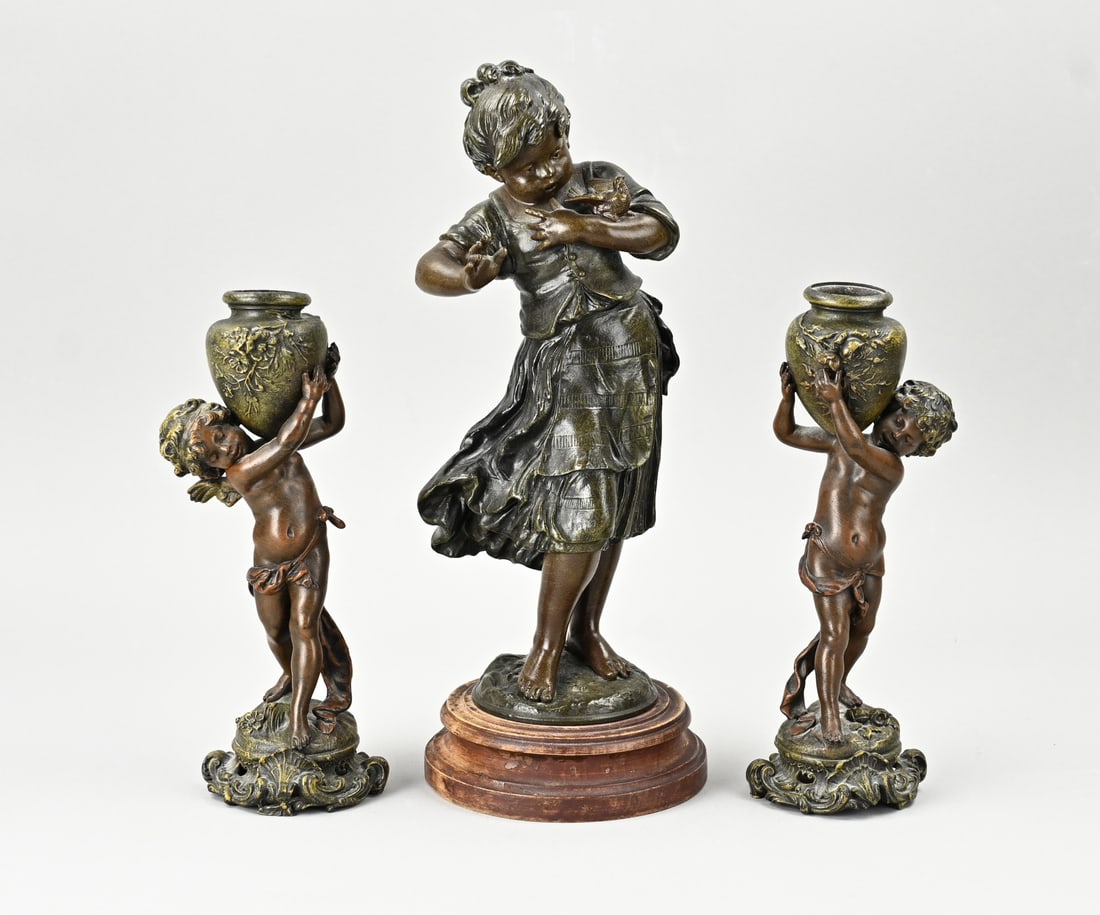 3x Composition metal sculpture: Three antique French composition metal figures. Circa 1900. Angels with amphoras + girl with bird. Dimensions: 23 x 33 cm. In good condition.