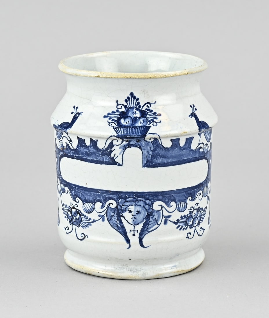 Delft apothecary jar: 18th-century Delft faience apothecary jar with peacock and cherub decoration. Dimensions: 11.5 cm. In good condition.