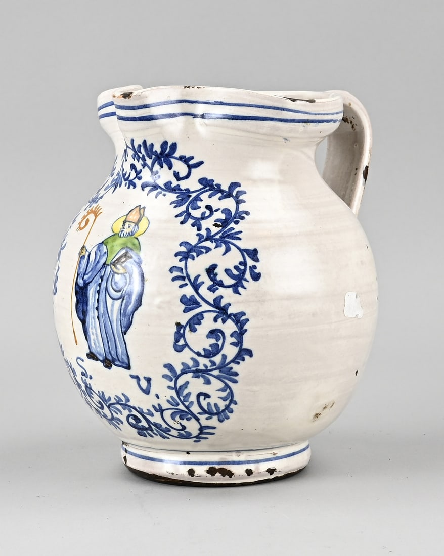 Majolica pitcher (religious), H 20 cm.: 18th - 19th century polychrome faience pitcher with an image of a cardinal. Marked SV. Dimensions: H 20 cm. In good condition.