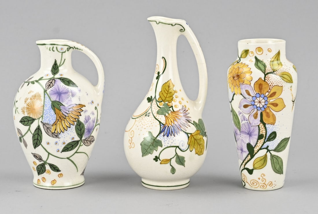 3x Gouda earthenware vase, H 14.5 - 16.5 cm.: Three antique Dutch polychrome Gouda earthenware vases with floral decoration. Art Nouveau. Circa 1910. Dimensions: H 14.5 - 16.5 cm. In good condition.