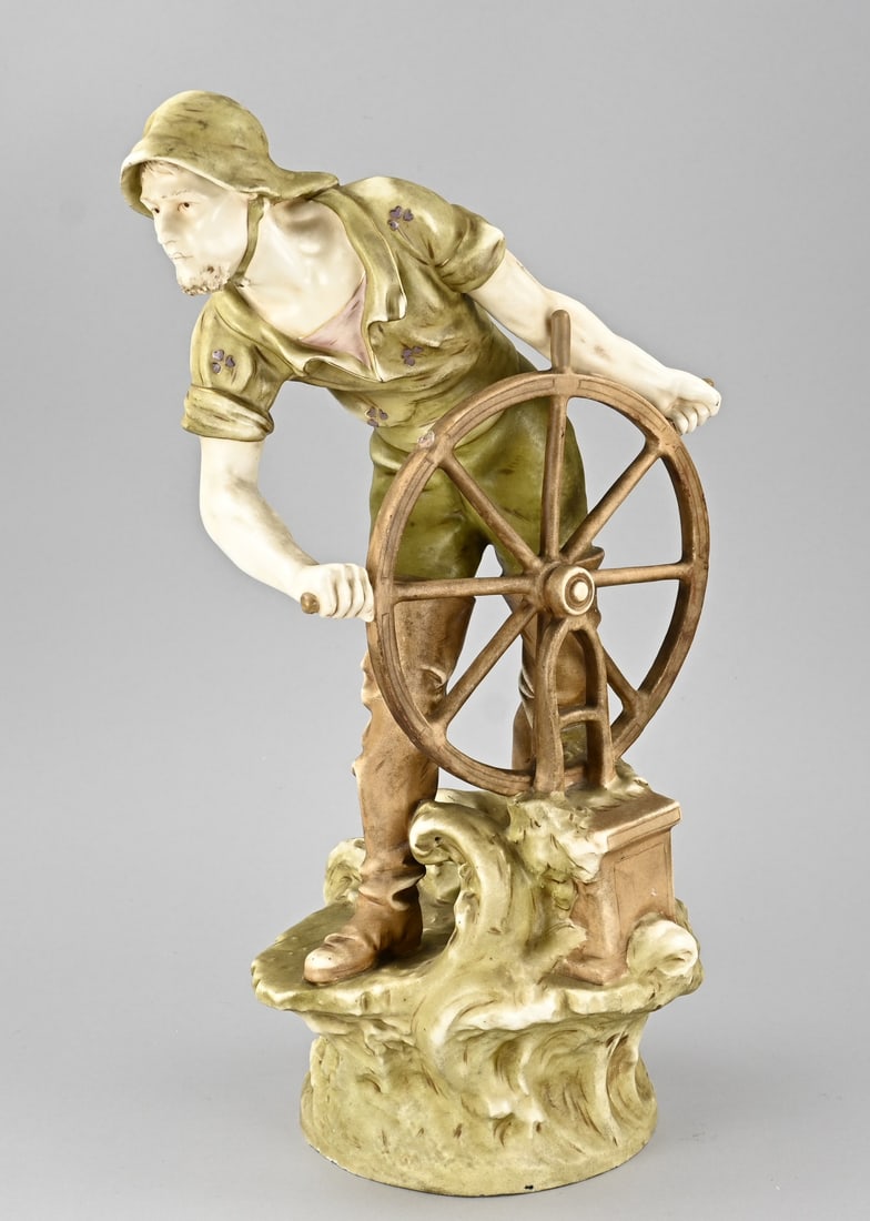 Porcelain figure, H 50.5 cm.: Antique, Austrian, porcelain figure. Circa 1900. Helmsman. Steering wheel damaged. Dimensions: H 50.5 cm. In reasonable condition.
