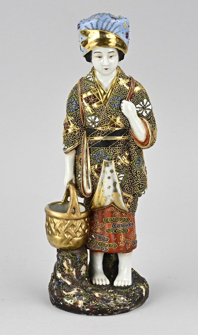 Satsuma statue, H 31 cm.: Antique Japanese porcelain Satsuma figurine. Water carrier with gold decoration. Circa 1900. Dimensions: H 31 cm. In good condition.