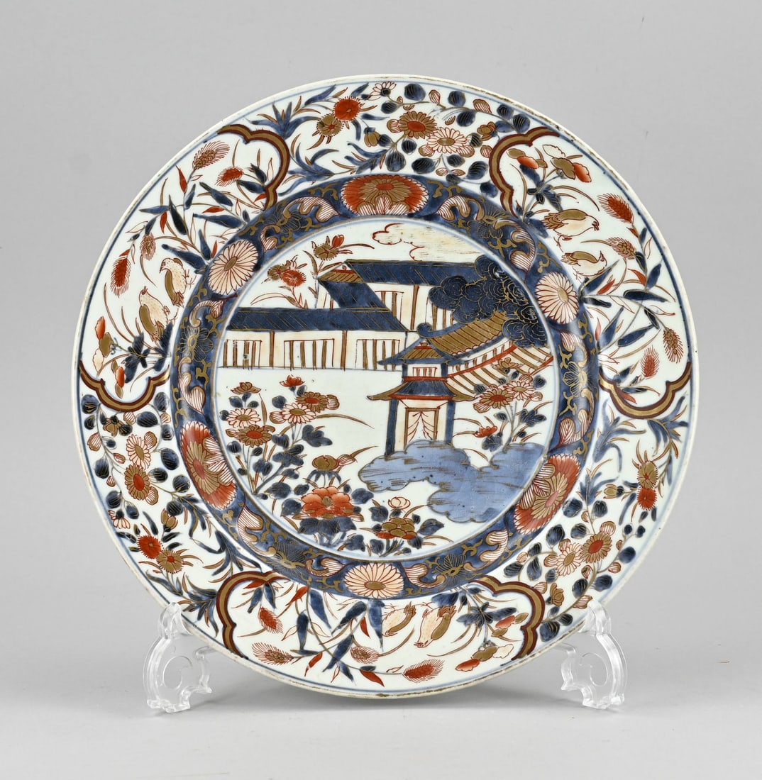 Japanese plate Ø 31.2 cm.: Antique Japanese porcelain plate with floral/bird/pagoda and gold decoration. One chip. Dimensions: Ø 31.2 cm. In fair/good condition.