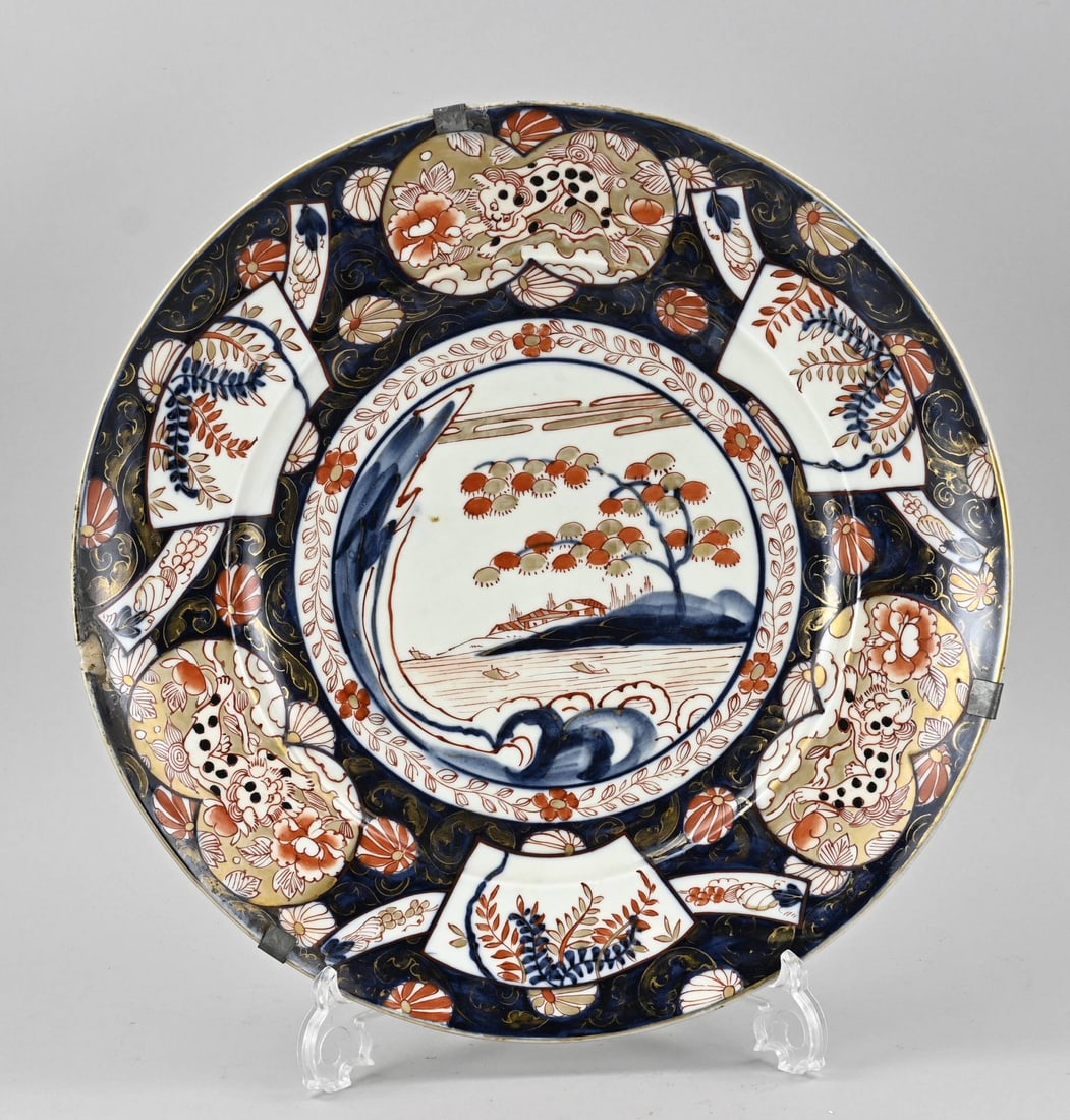 Imari dish Ø 40 cm.: 19th-century Japanese porcelain Imari decorative dish with landscape/floral/kylin and gold decoration. Dimensions: Ø 40 cm. In good condition.