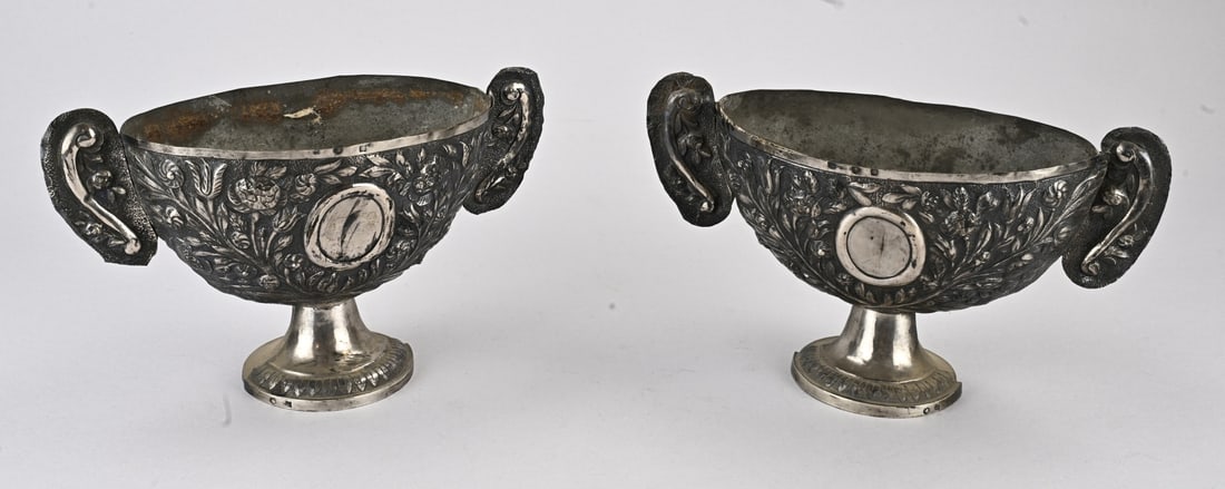 2 antique altar vases with silver: Two exceptional antique pewter and silver altar vases, 800/000 19th century or older. Oval vases on a round base, one half of which features a silver section, decorated with chased floral motif and a