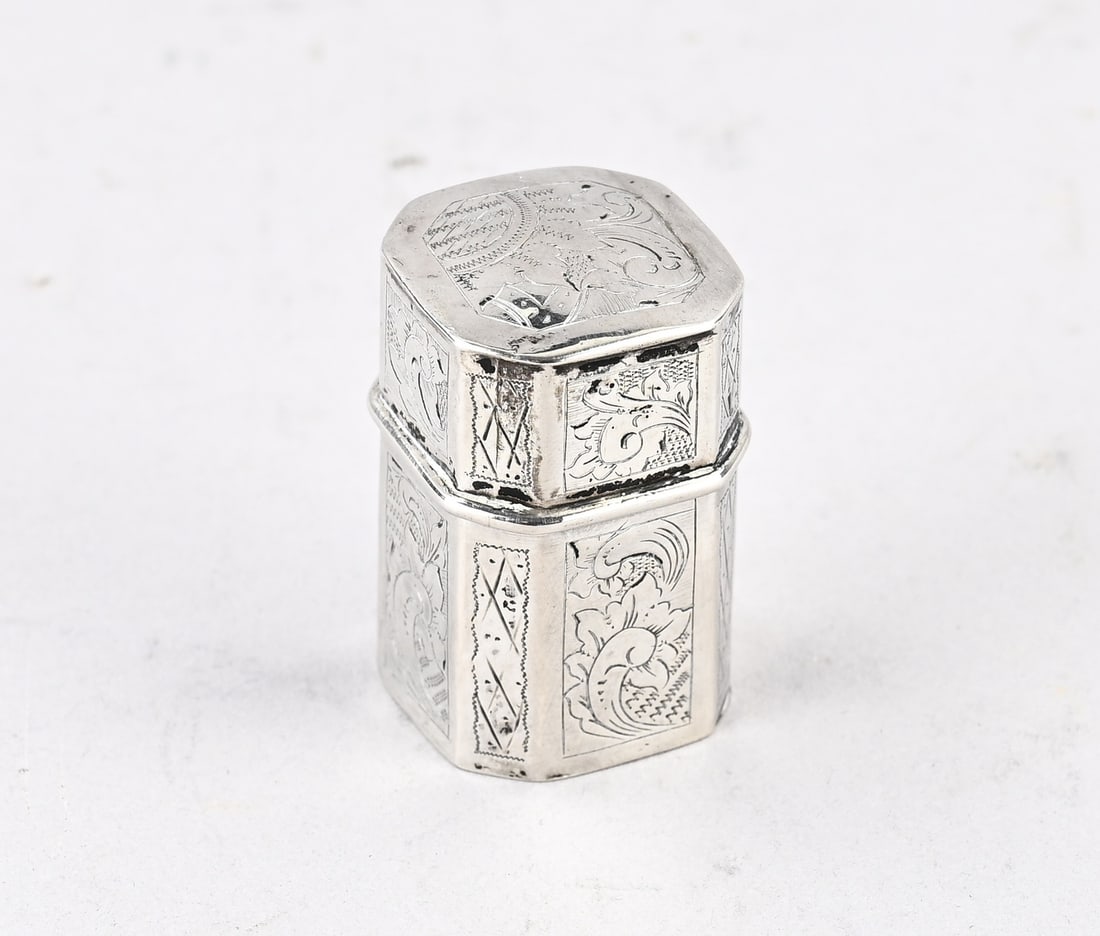 Silver snuff box: Silver snuff box, 833/000, square contoured model decorated with engraving. MT.: K.Haijkens, Delfzijl, dated 1863. 28x28x46 mm. approx. 20.8 grams. In good condition.