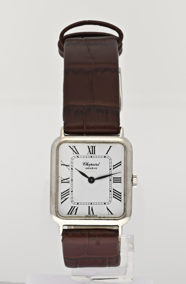 Chopard watch 18 carat: Vintage white gold Chopard watch, 750/000, octagonal model, mechanical. Features a white dial with Roman numerals. Mounted on a brown leather strap. Working. Case number: 56160 2028. Case size 26x23.5