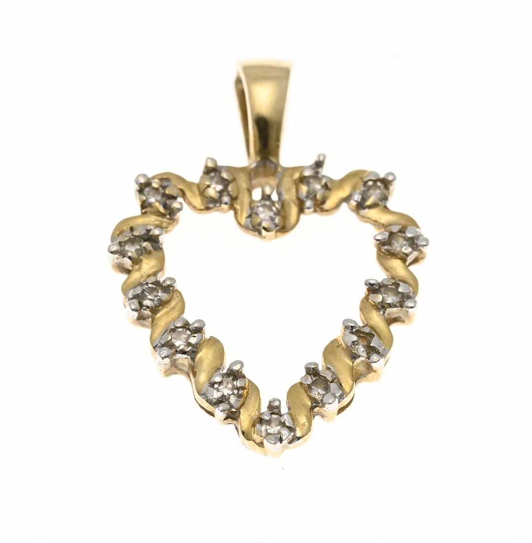 Golden heart with diamond: Yellow gold heart pendant, 585/000, set with diamonds. Open heart pendant set all around with 14 single-cut diamonds. Size 14x19 mm, including loop. Approx. 1.0 gram. In good condition.