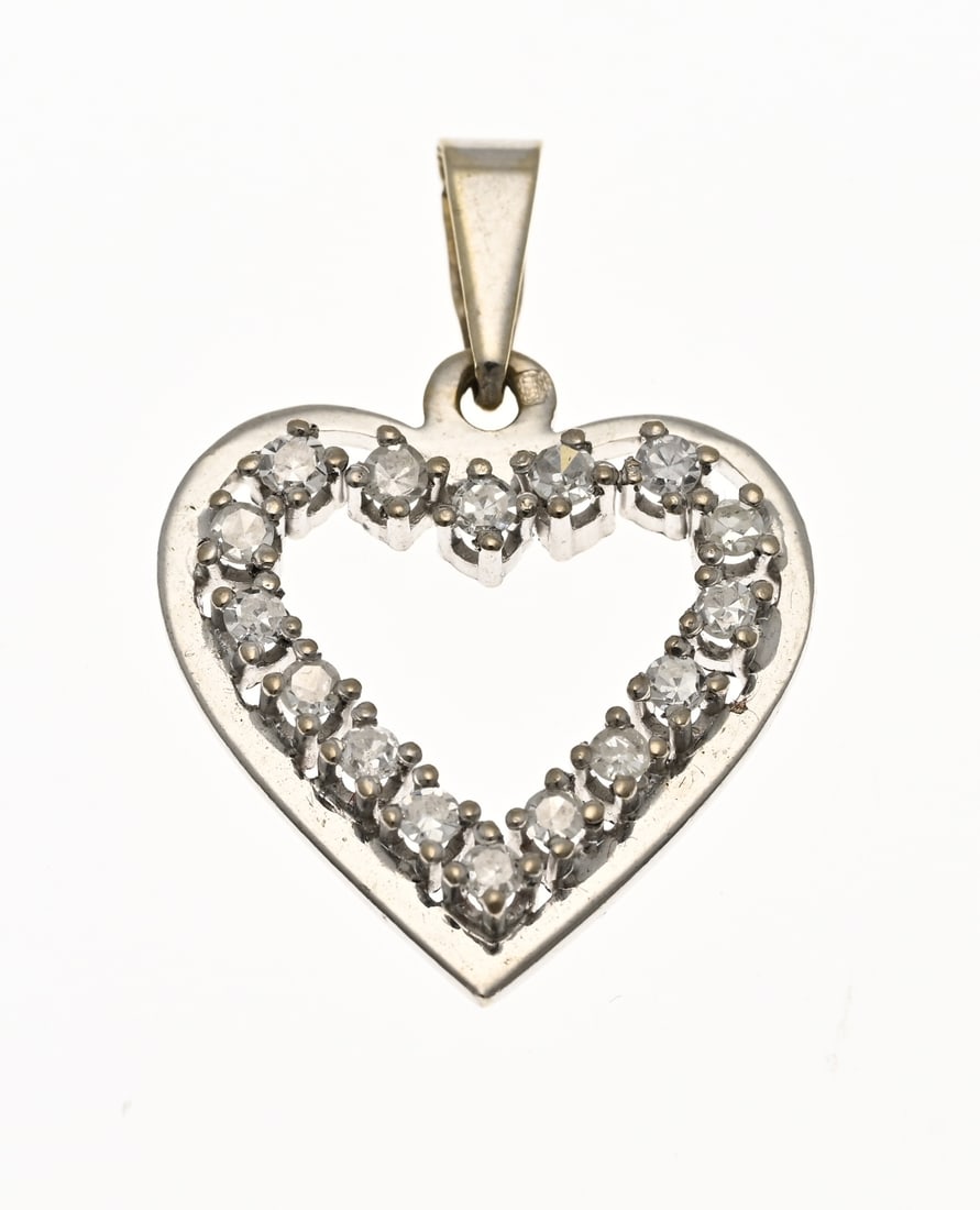 White gold heart-shaped pendant with diamond: White gold pendant, 750/000, heart-shaped with diamonds. Heart-shaped pendant set with 16 single-cut diamonds. 25x17mm, including loop. Approx. 2.0 grams. In good condition.