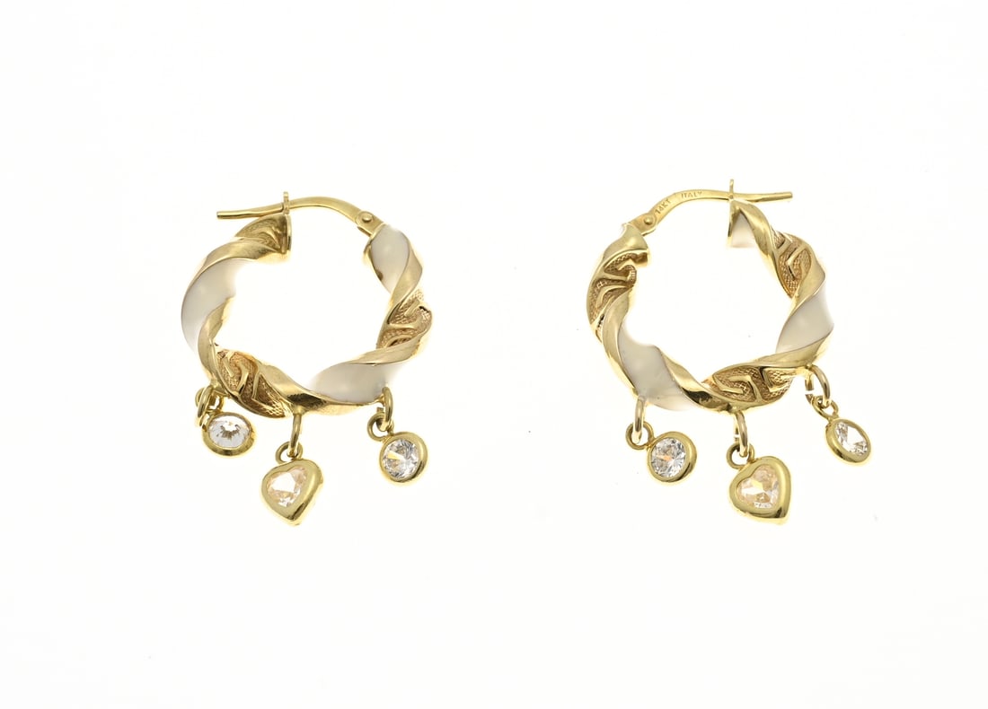 Gold hoop earrings with enamel and zirconia: Yellow gold hoop earrings, 585/000, with white enamel and cubic zirconia. Hoop earrings with a twisted design featuring white enamel and meandering detailing. Attached to the hoops are 3 pendants