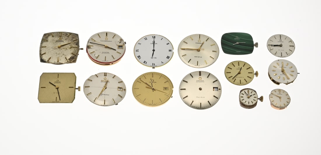 Lot of Omega timepieces with dials: Lot of 14 movements, Omega, including de Ville and Constellation. Quartz, mechanical, and automatic. And a ladies' automatic. Functionality not tested.