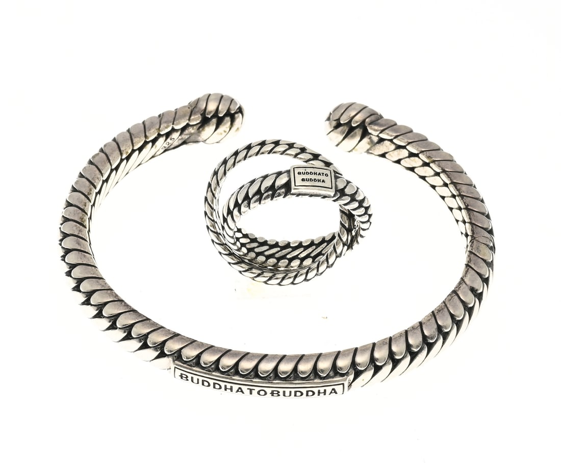 Silver Buddha to Buddha bracelet and ring: Silver Buddha to Buddha bracelet and ring, 925/000, hinged bangle, model Ben Torque, width 7.5 mm. ø 59x47mm. and a matching ring, Ben Double, width 10 mm. ø 52. Total approx. 45.9 grams.