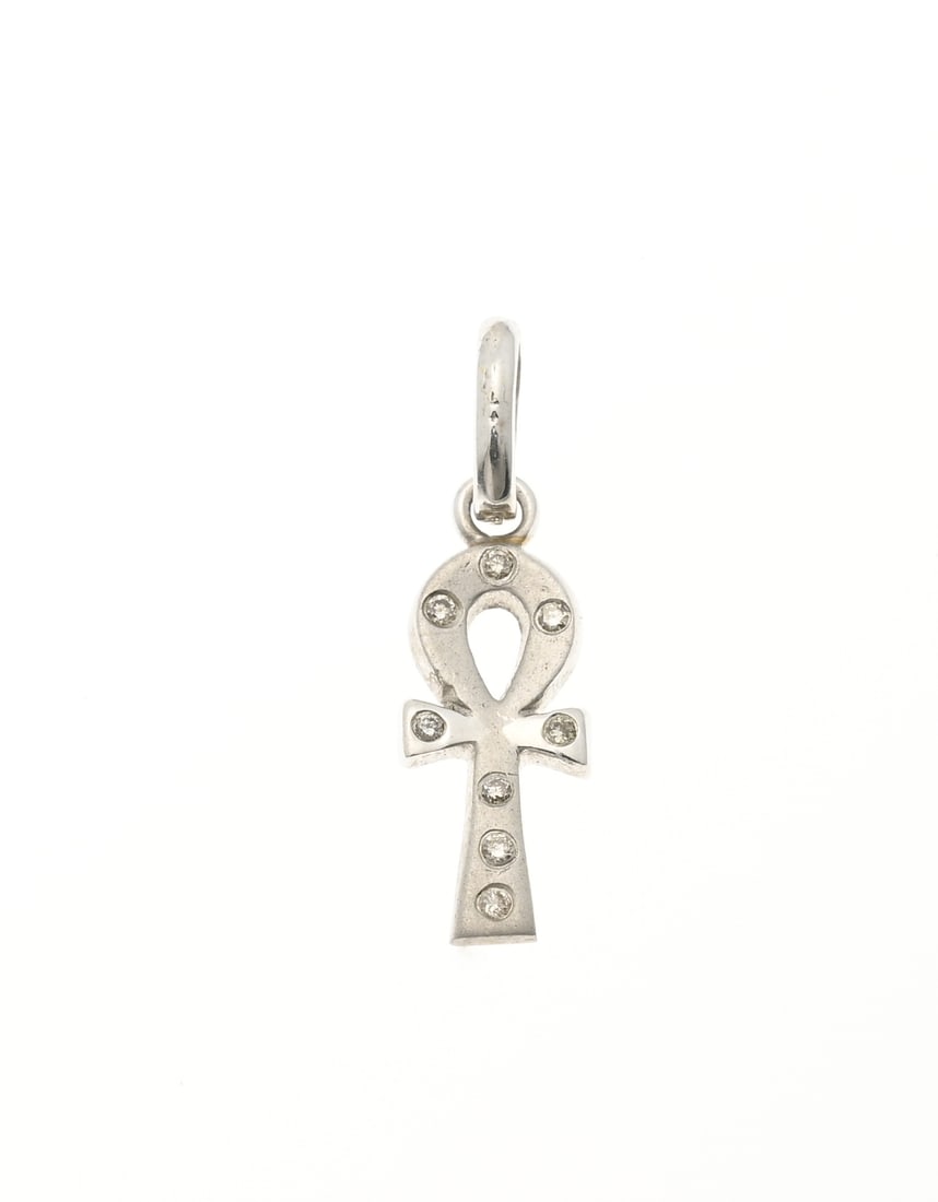 White gold Ankh pendant: White gold pendant, 750/000, a cross of life, with diamonds. Ankh set with 8 small diamonds pave-set in the pendant. Pendant size 23x7mm, including loop. Approx. 1.2 grams. In good condition.