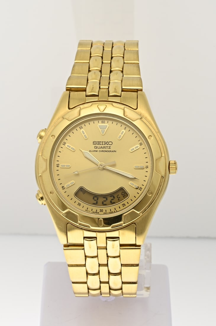 Seiko watch analog/digital: Vintage Seiko watch, analog digital. Alarm chronograph quartz H801-7001. Gold-plated. Case diameter 37 mm. Length 19 cm. Case number: 320196. As new