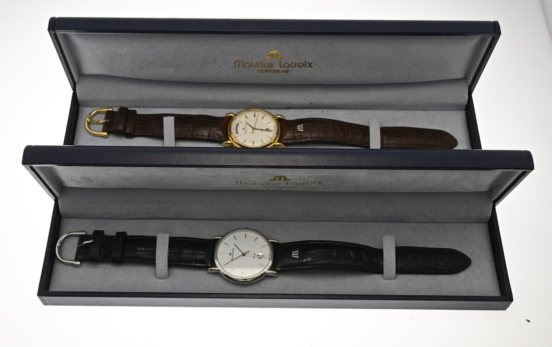 2 Maurice Lacroix watches: Two Maurice Lacroix watches in box, a Les Classique Date, gold-plated steel with day and date display. ø 34 mm. And a brown original strap. Case number: 96376. And a Les Classique Date, steel