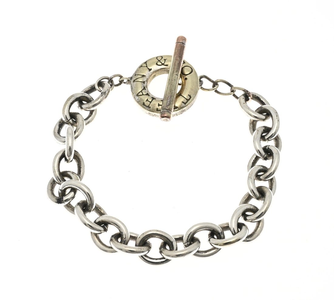 Silver bracelet: Silver bracelet, 925/000, with eye links and a toggle bar and gold-plated loop with engraved text: 21 cm. approx. 31.8 grams. In good condition.