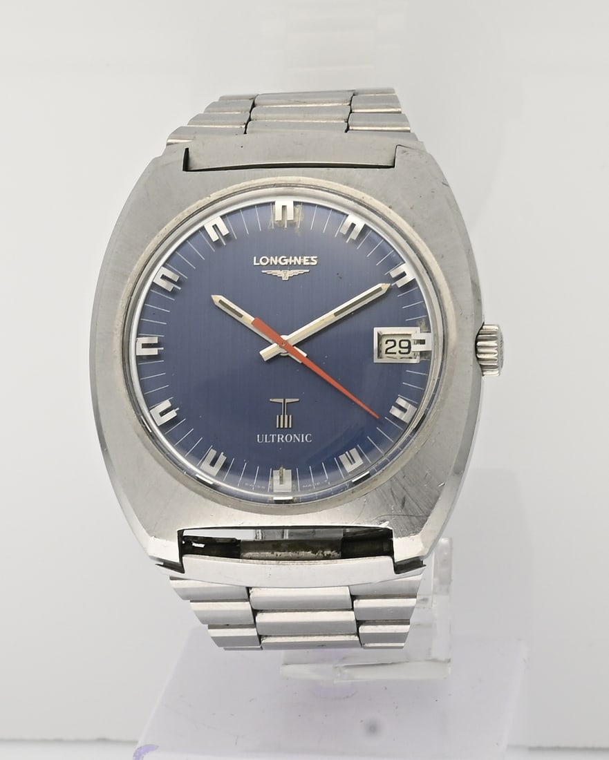 Vintage Longines watch: Vintage Longines watch, steel, Ultronic, with a blue-grey dial featuring a date display. Case diameter 41 mm. Case number 16182096. With steel bracelet. Working. Some signs of wear, otherwise in good