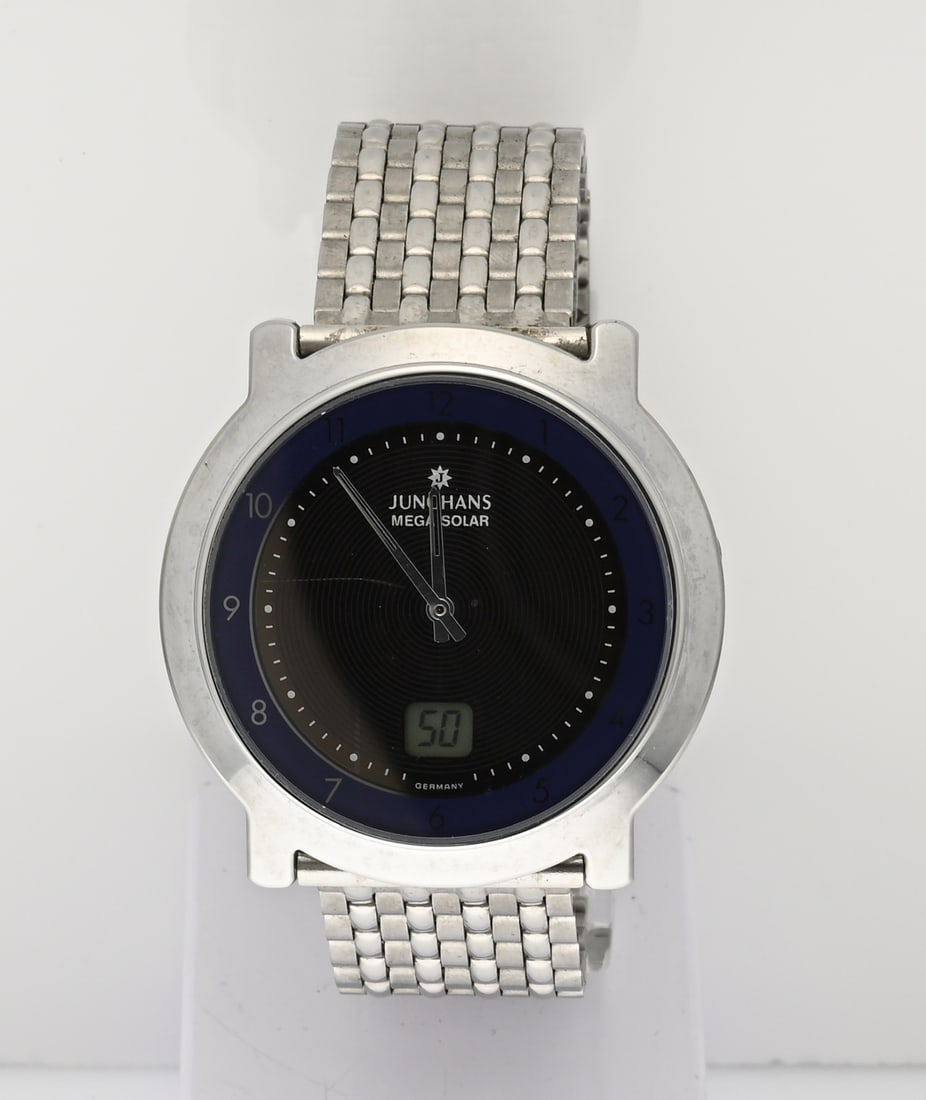 Junghans Solar watch: Beautiful Junghans Mega Solar watch, steel and steel bracelet. Case diameter 38.5 mm. Case number: 035/1804 903. Working. In good condition.