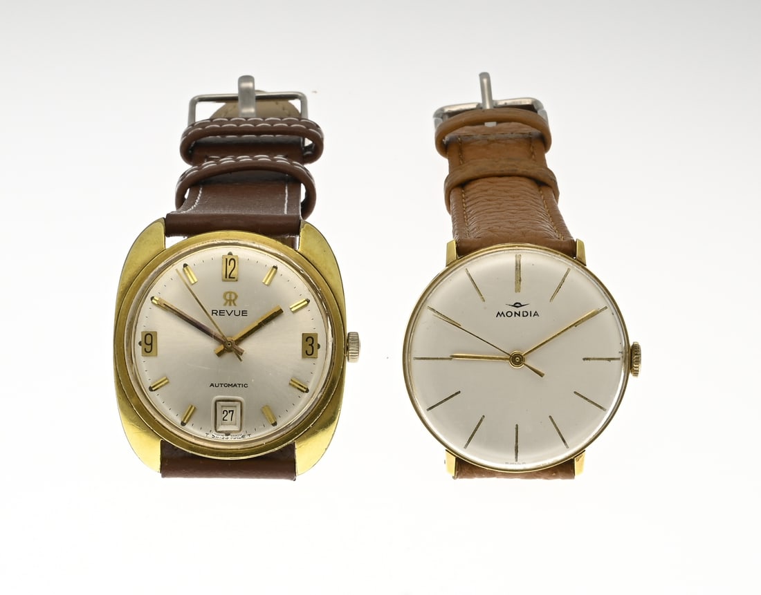 2 Watches, Mondia, Revue: Two vintage watches, mechanical, gold-plated models. A round, delicate Mondia model, case diameter 33 mm. Glass slightly scratched. And a somewhat coarser model, Revue, with date display. Case