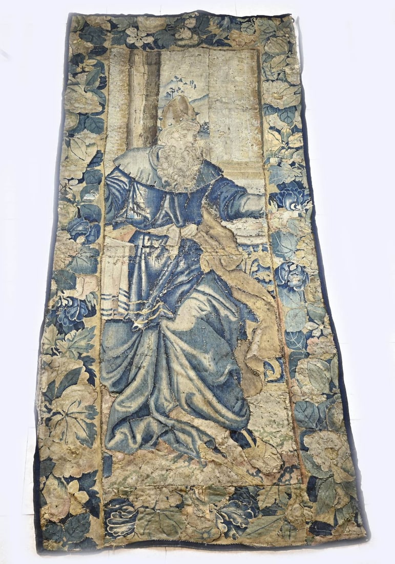 16th-century tapestry: Large 16th-century tapestry with Saint and vines. Dimensions: 259 x 109 cm. Damaged. In fair/good condition.