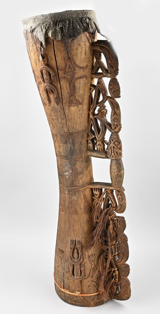 Ashtray drum, 96 cm.: Authentic ethnographic Asmat drum with carving, Papua, New Guinea. First half of the 20th century. Dimensions: 96 cm. In good condition.