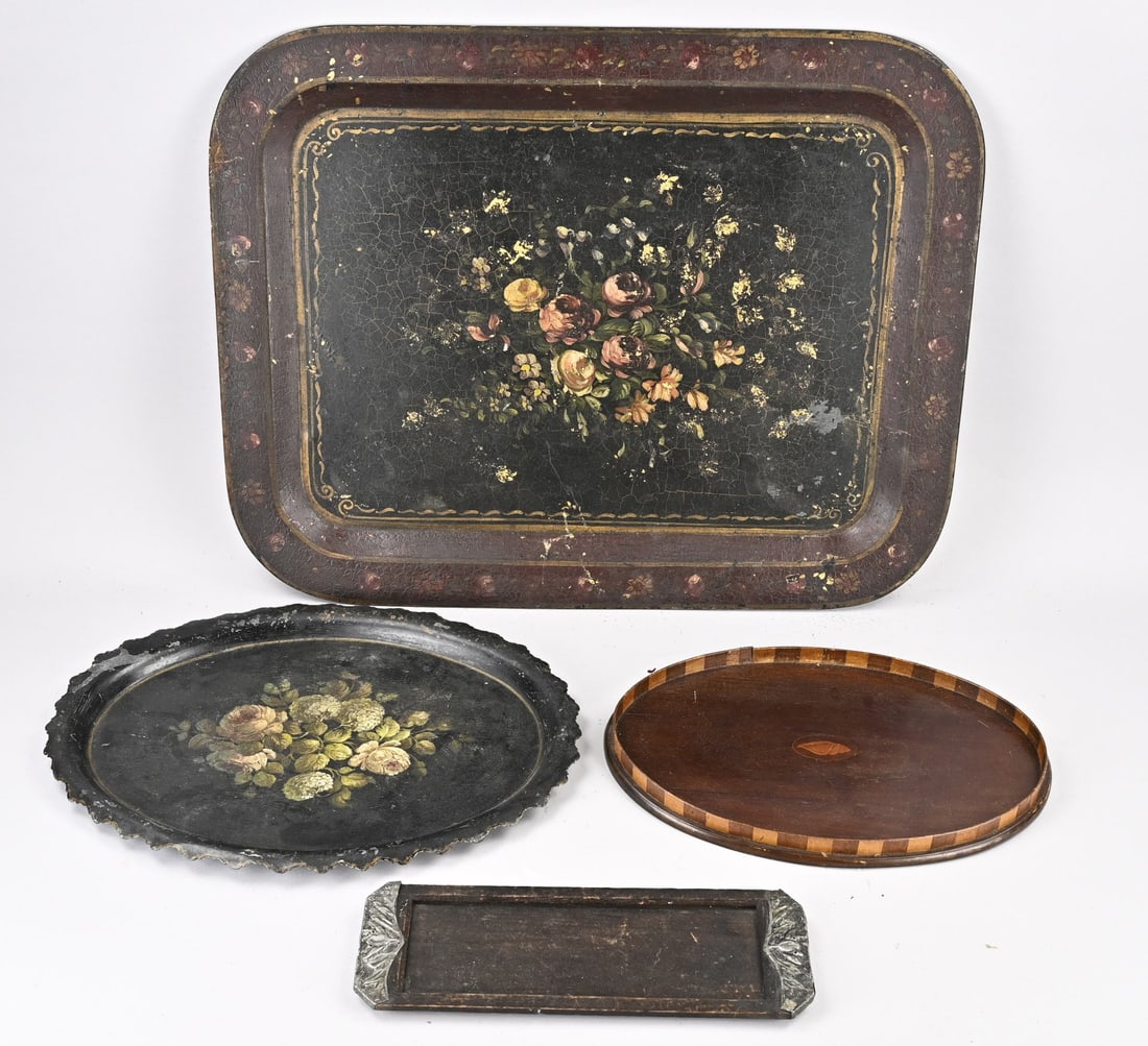 Lot of antique serving trays: Lot of four antique serving trays. 2x Painted tin. 1x Mahogany. 1x Art Nouveau. Dimensions: 32 - 63 cm. In good condition.