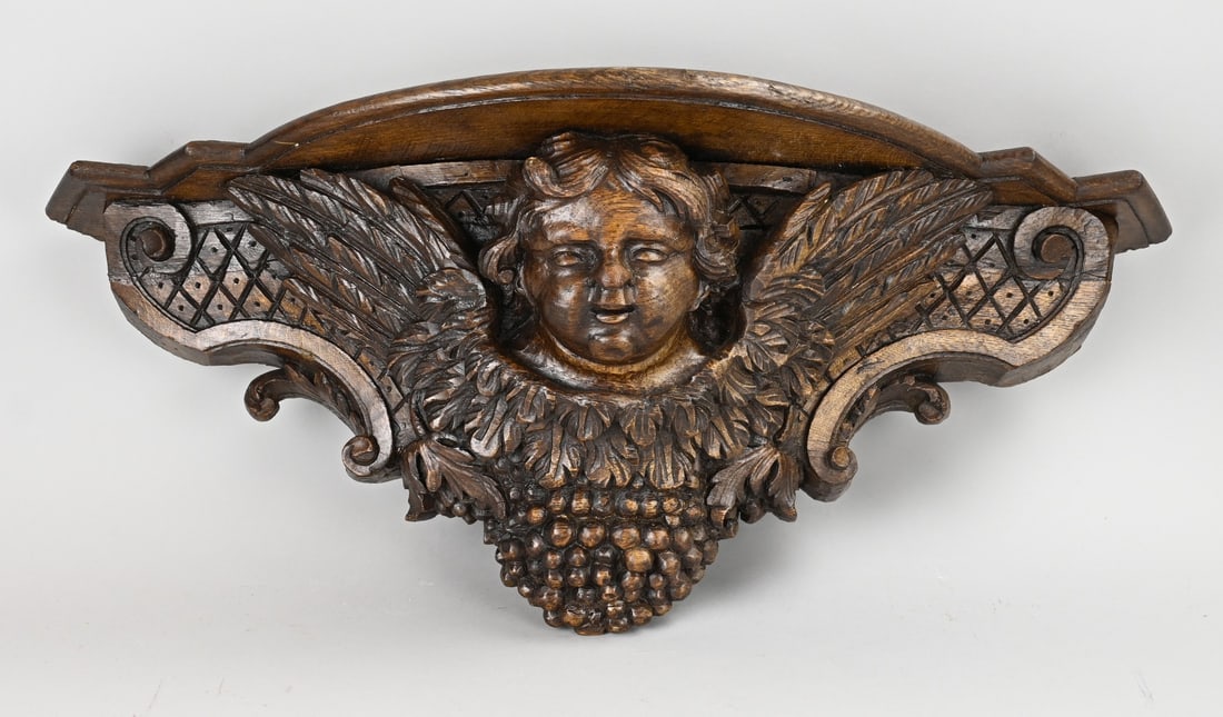 Console with angel figure: Large, 19th-century carved oak wall console with angel and grape decoration. Dimensions: 68 x 23 x 28 cm. In good condition.