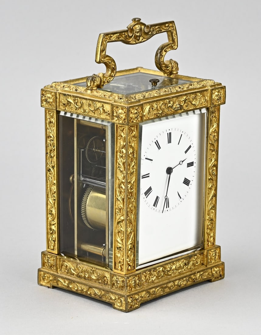 French travel alarm clock, 1900: Beautiful antique gilded bronze French travel alarm clock. Half-hour strike on bell + alarm. By Japy Freres. Eight-day. Art Nouveau. Circa 1900. Dimensions: 17 x 9.5 x 9 cm. In working condition.
