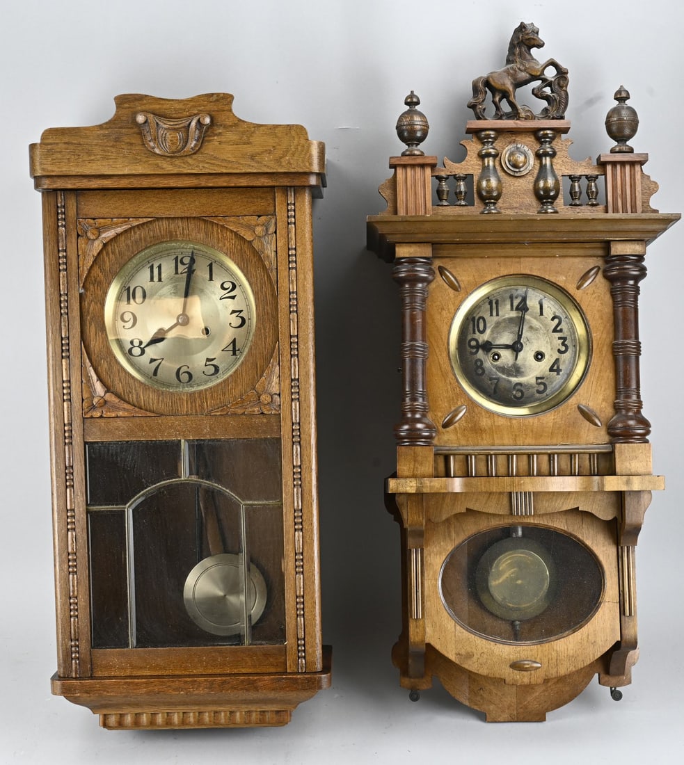 2x Clock (pendulum + chime): Two antique clocks. 1x Walnut pendulum, Germany, circa 1900. 1x Bim Bam regulator, circa 1920. Dimensions: 80 - 95 cm. In good condition.